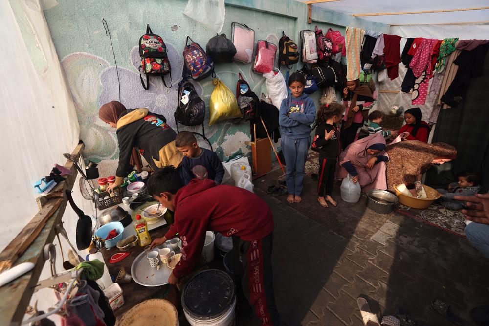 Displaced Palestinians in Rafah, in what was a designated safe zone southern Gaza, in December. Israeli forces have since moved forward with a Rafah offensive, forcing hundreds of thousands to flee yet again. Palestine 2023 © MSF