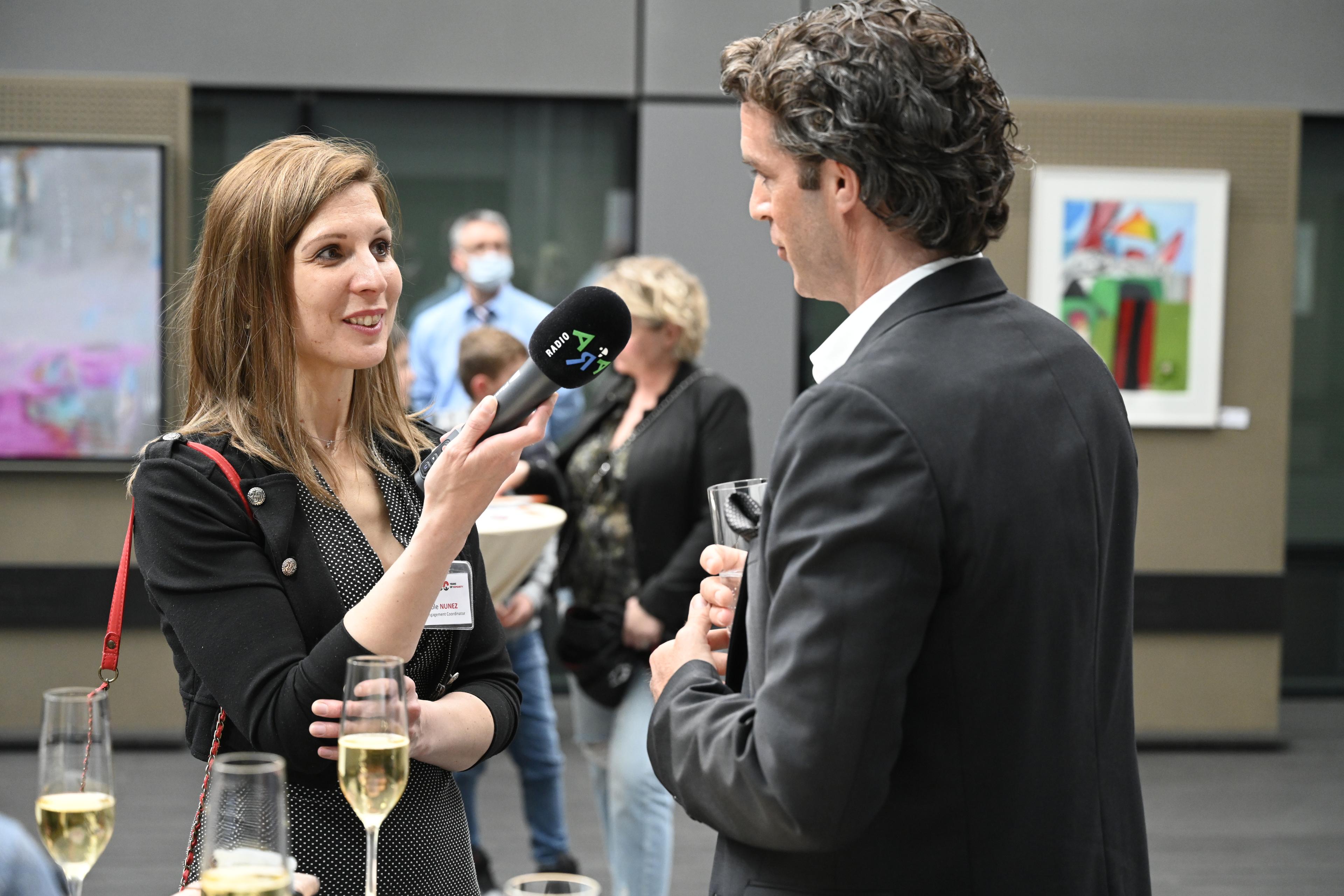 MSF Luxembourg interviews British artist Ben Carter for its radio broadcast on Radio ARA during the exhibition. April 24,2022 