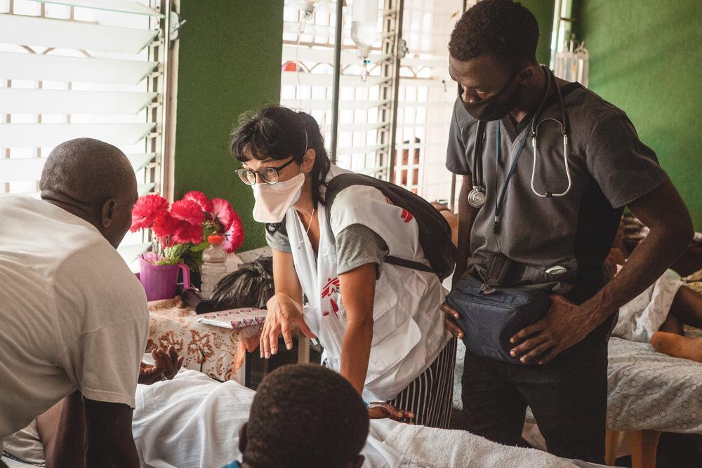 MSF staff work with local hospital staff in the post-operative ward of Immaculate Conception Hospital in Les Cayes, Haiti. 