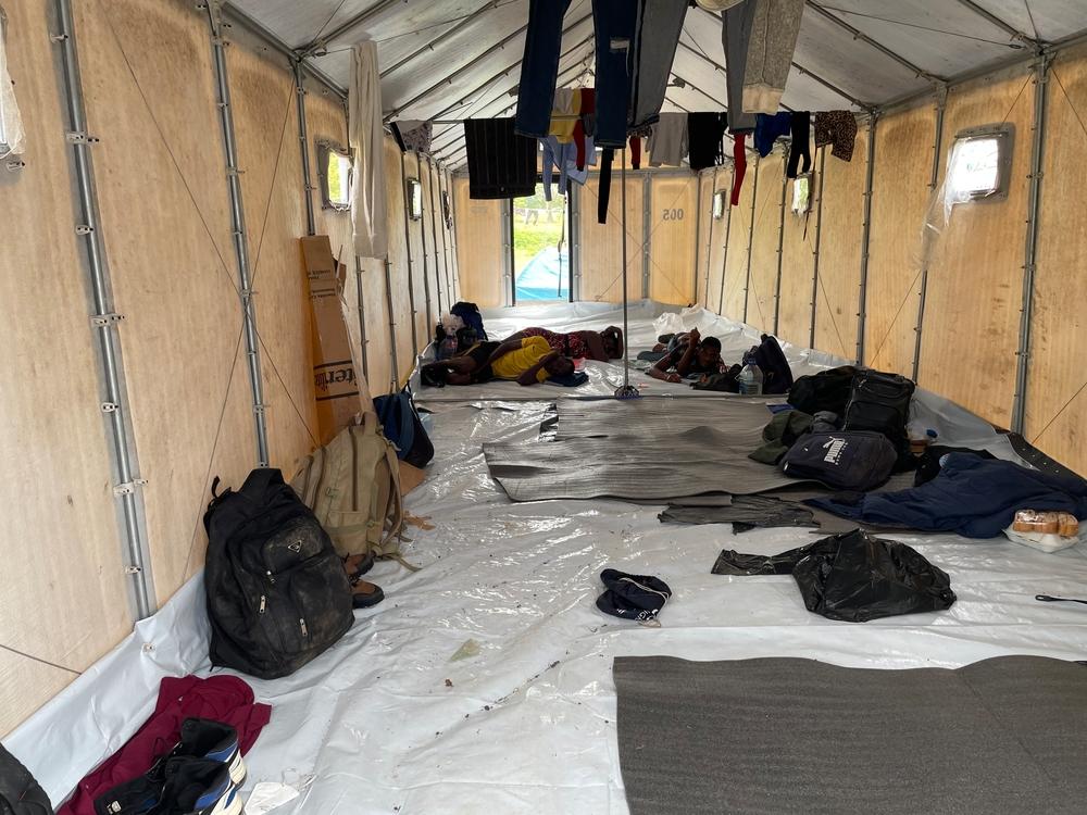 Some of the migrant shelters do not have adequate floors, so water seeps in. Yet migrants have to sleep on the floor. 