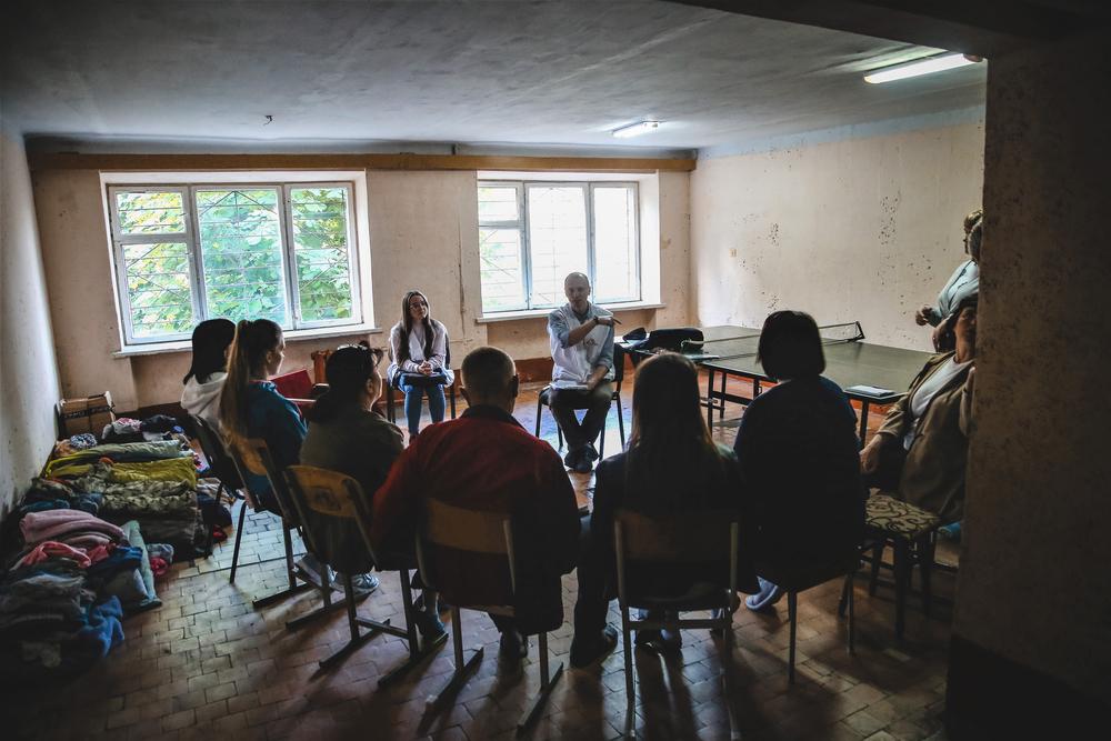 Internally displaced people from eastern Ukraine attend a psychoeducation session in the city of Ivano-Frankivsk, in the southwestern part of the country. May 2022 