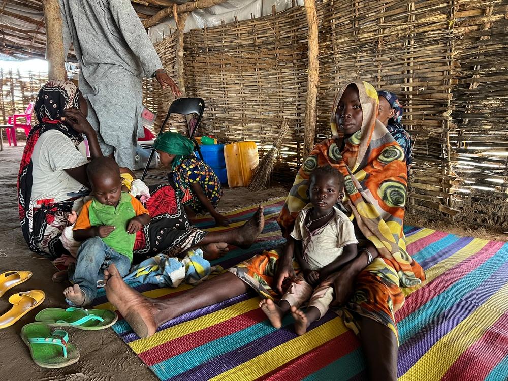 A family of Sudanese refugees wait for a medical consultation at Korsi refugee camp in the town of Birao, in the north of Central African Republic. 