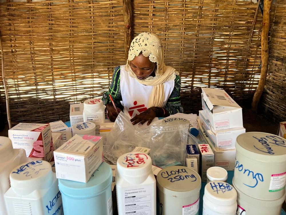 An MSF team member prepares medicines at the health post in Korsi refugee camp in the town of Birao, in the north of Central African Republic. 