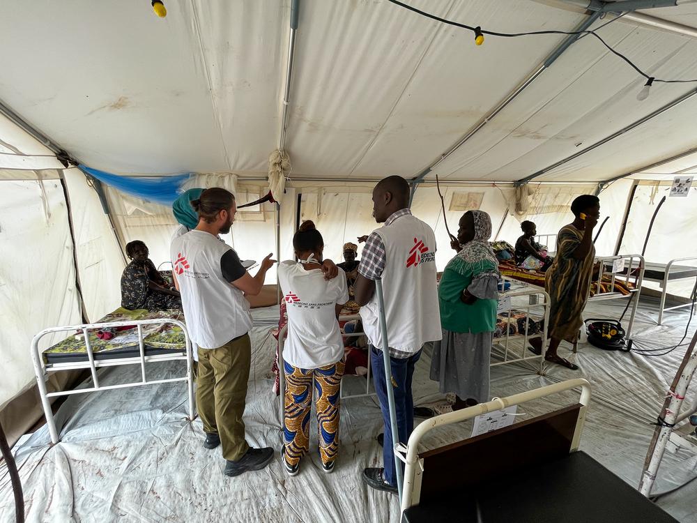 MSF medical staff examine patients at the MSF-supported hospital therapeutic feeding centre at Renk Civil Hospital in Upper Nile State. 