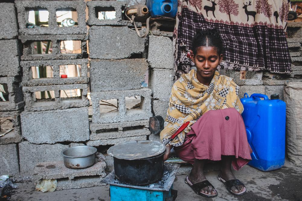 Hundreds of people in Shire’s University IDP site live in an unfinished building, where they sleep, cook and eat. Many don’t have mattresses or blankets. 