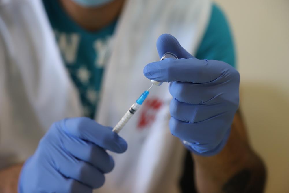 A member of the MSF mobile vaccination team prepares a dose of COVID-19 vaccine at a nursing home in Shayle, Mount Lebanon.  