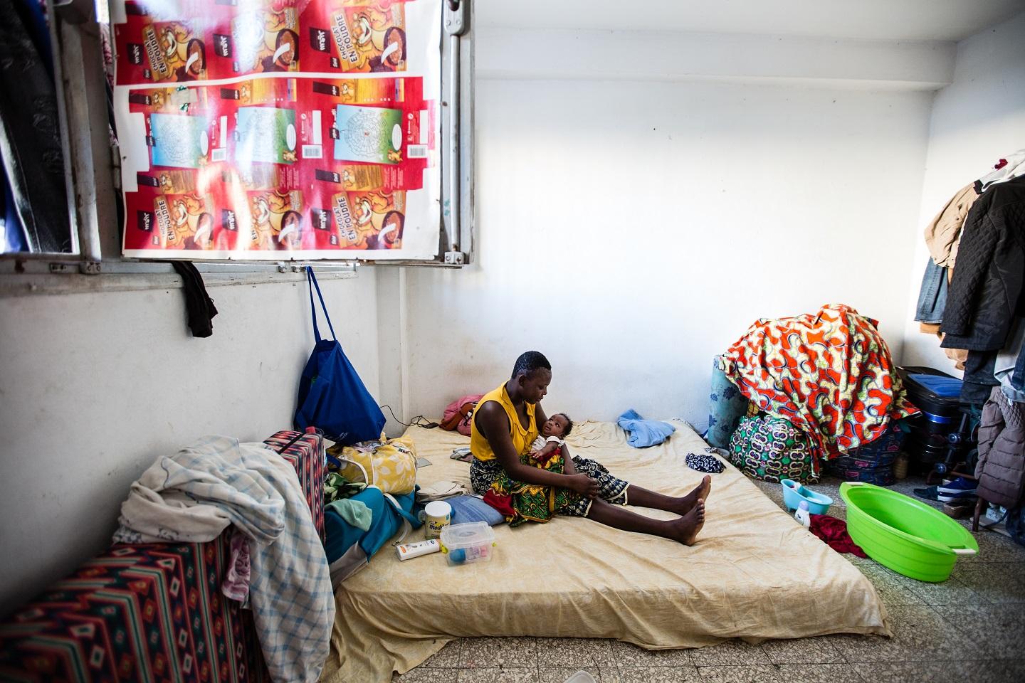 A mother and her two-month-old baby in migrant accommodation in Sfax, Tunisia. 