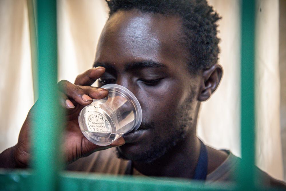 Drug addict Michael Karongo takes methadone at MSF's drug therapy clinic in Kiambu. March 2020 