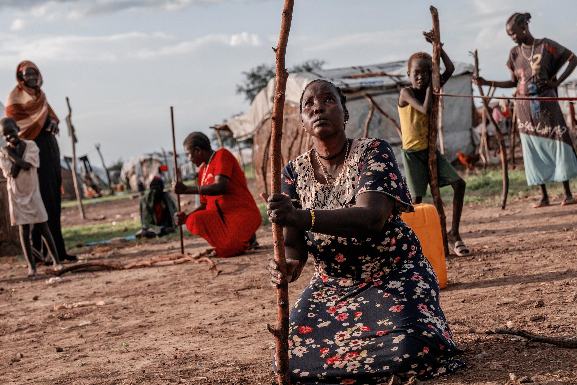 Cinq familles sont récemment arrivées à Abyei après un long voyage périlleux à travers des régions déchirées par le conflit au Soudan. © Sean Sutton/Panos Pictures