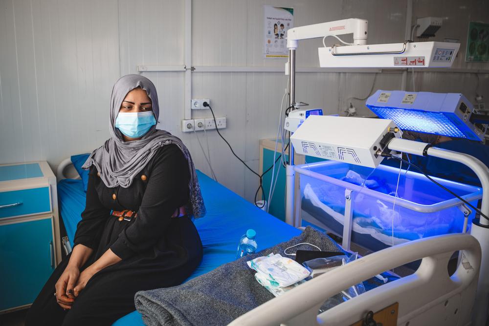 ihan Ahmed (name changed), aunt and caretaker of Samad, a newborn admitted to the inpatient department of MSF-run Nablus hospital as he was born with jaundice. 