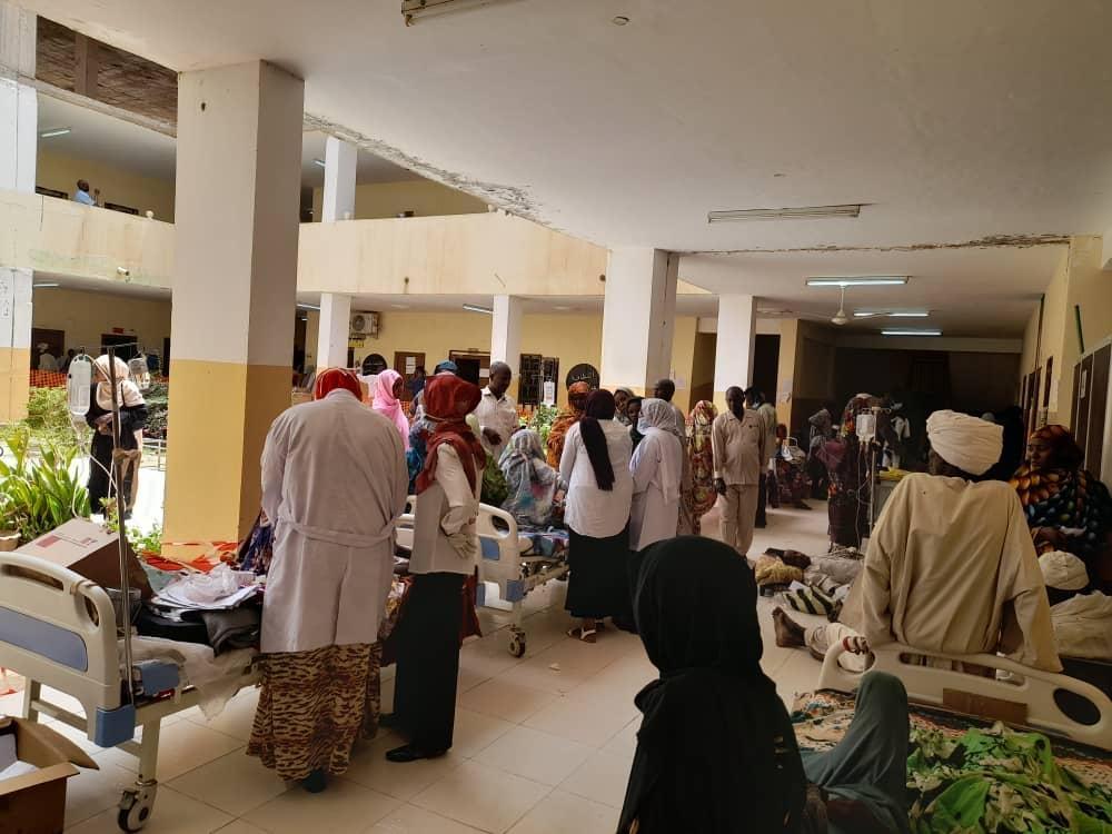 People waiting for treatment at El Fasher hospital. Sudan, May 2023. 